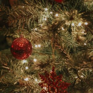 Warm, festive interior of The Punch Bowl decorated for New Year’s Eve & Christmas