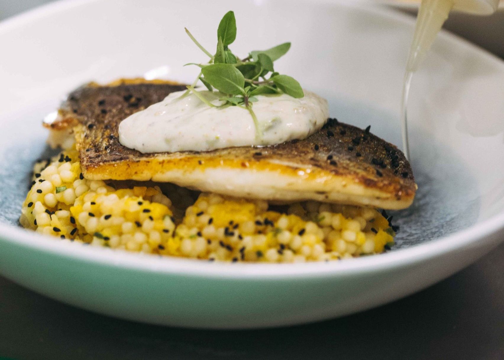 Fish with giant cous cous