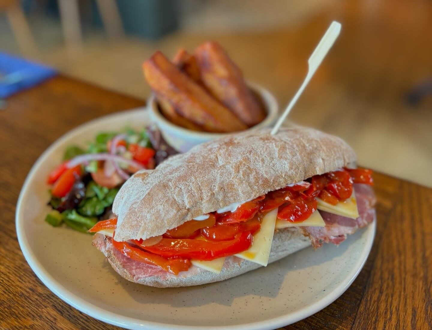 The Punch Bowl lunch time sandwich with cheese, ham salad and chunky chips.